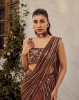 Dusk Saree Set - A traditional brown saree with intricate patterns