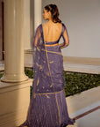 Glam Blue Saree Set - Woman in a purple saree