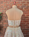 Beige Sequin work Corset and Lehenga - blouse back design