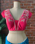 Teal Chiffon Embroidered Saree. Pink embroidered blouse
