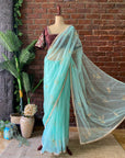 Ice Blue Organza Embroidered Saree - Light blue saree with gold border