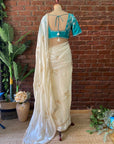 Ivory Tissue Embroidered Saree - White saree with a blue blouse