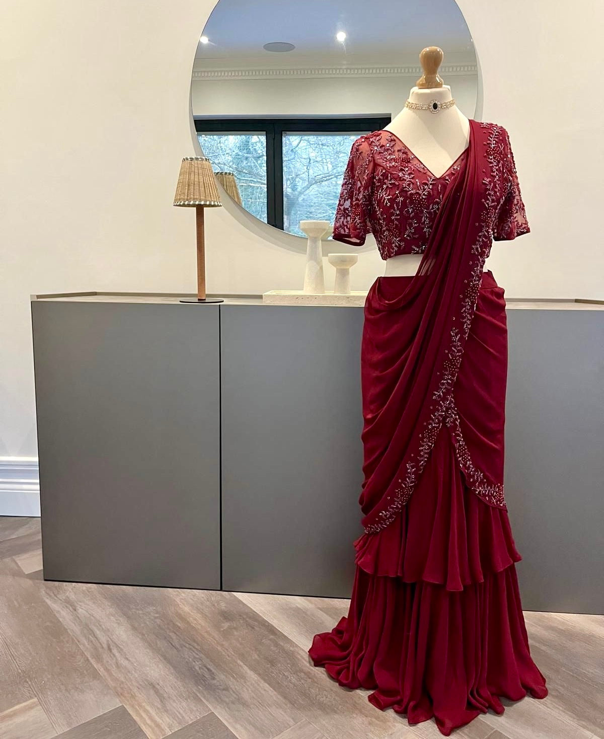 Burgundy Ruffle Saree with Self Embroidery - Red saree with a matching blouse
