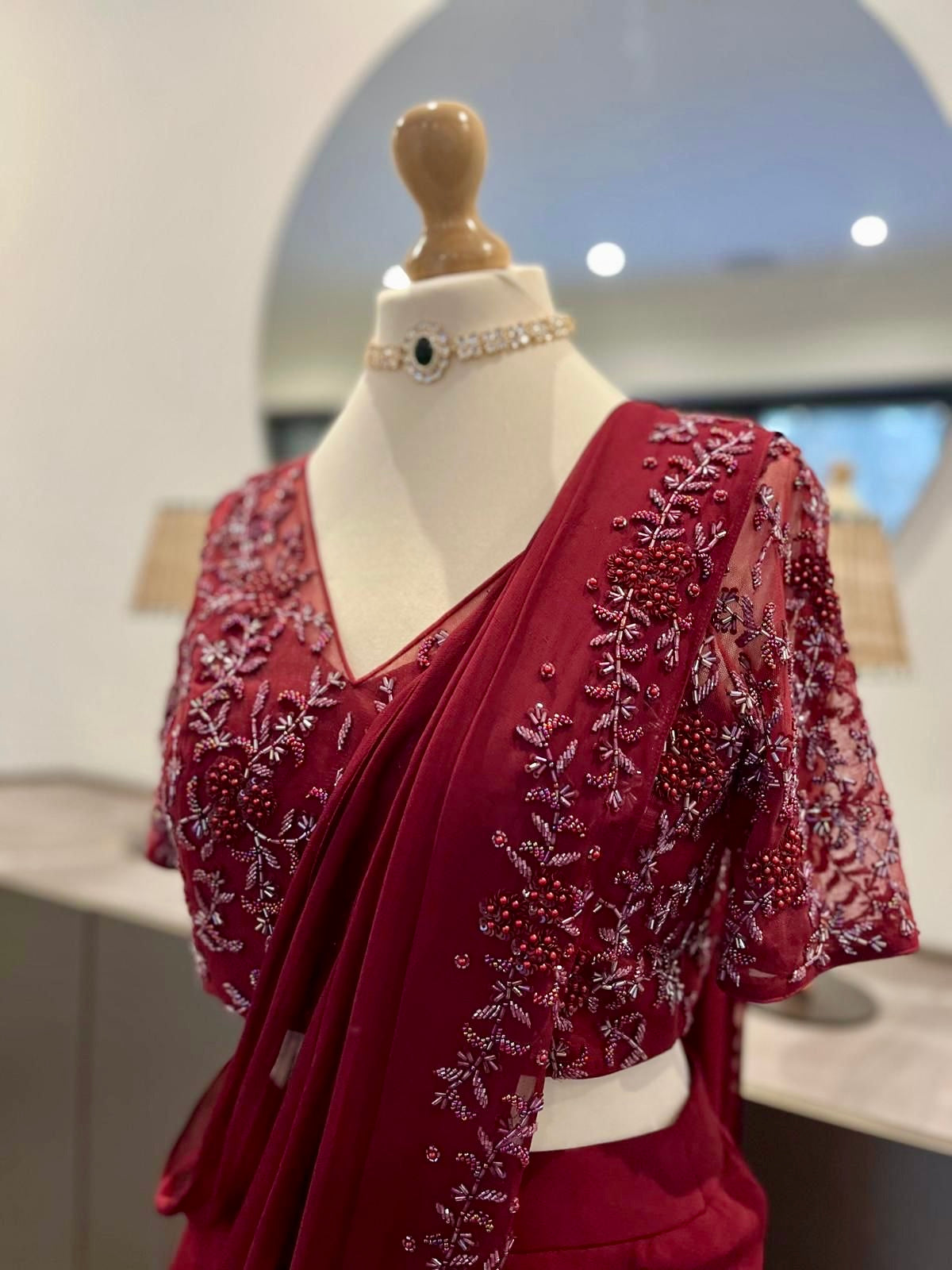 Burgundy Ruffle Saree with Self Embroidery