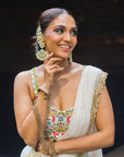 Ivory Pre-Stitched Ruffle Saree with Multi-Hued Embroidered Blouse - indian designer wear