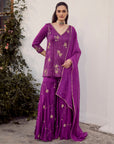 Plum Embroidered Sharara Set - Woman wearing a purple traditional Indian lehenga