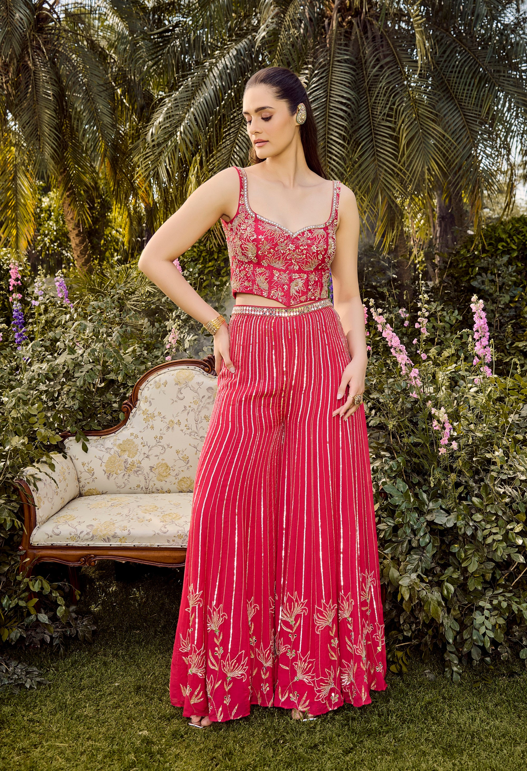 Vibrant Hot Pink Pant Set. Woman in a pink floral dress