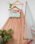 Apricot Peach Lehenga with Sky Blue Blouse and Dupatta