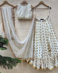 Ivory Ruffle Lehenga And Raw Silk Blouse Set - ivory lehenga set