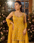 Marigold Sharara Set - Woman in a yellow traditional outfit